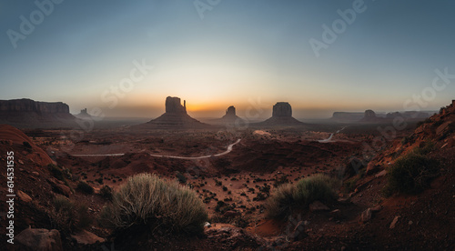Panoramic view of Monument Valley USA Utah during Sunset and sunrise with famout view to the sisters and west mitten butte