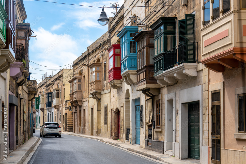 Island of Malta, typical house facades with wooden balconies.