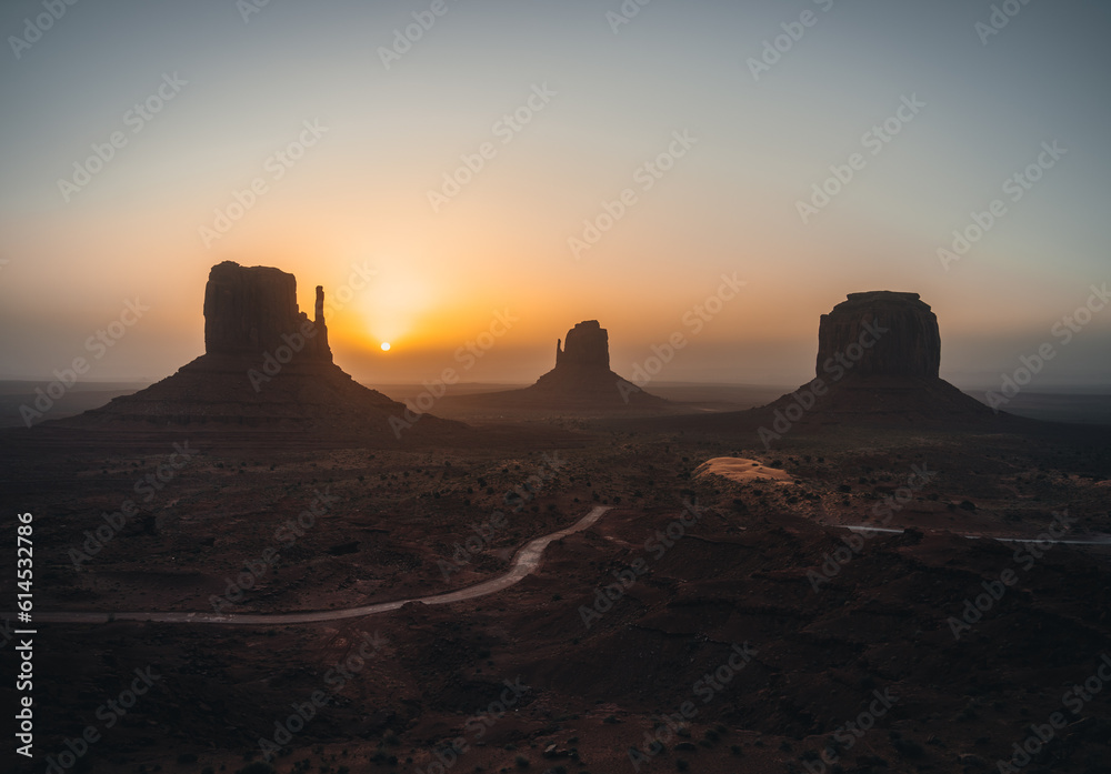 Monument Valley USA Utah during Sunset and sunrise with famout view to the sisters and west mitten butte Monument Valley USA Utah during Sunset and sunrise with famout view to the sisters and west mitten butte