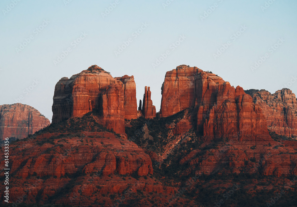 A close up on the sandstone saddle points, or gaps of Cathedral Rock, one of the most famous natural landmarks surrounding the desert town of Sedona, Arizona, in the Coconino National Forest, USA.