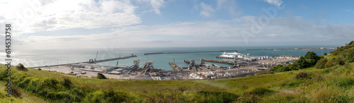 Dover, Great Britain - Harbor near Dover town on coast of England with ships with warehouses.
