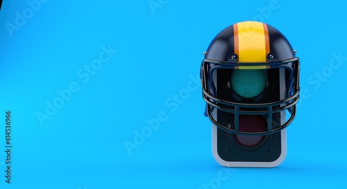 Green traffic light with rugby helmet
