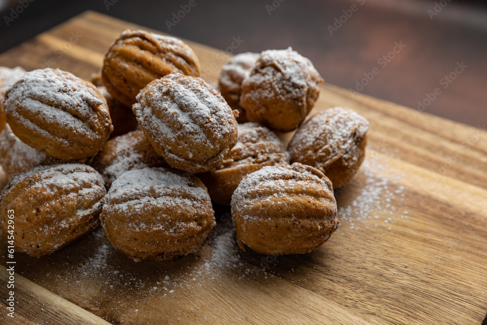 Delicious cookies on a wooden board. Close up Delicious cookies on a wooden board. Close up