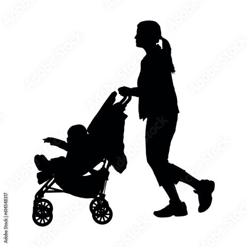 Young mother pushing a baby in stroller side view black silhouette.