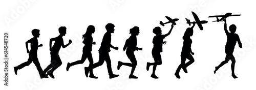 Group of children running with holding toy airplanes vector silhouettes. Kids playing having fun together outside silhouette.