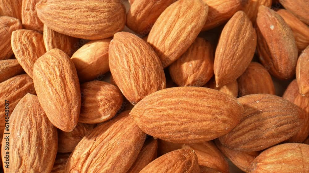 It becomes evident that the almond kernel has a thin. The intricate network of tiny lines and crevices on the skin, showcasing the natural beauty and complexity of the almond. Almond background.
It becomes evident that the almond kernel has a thin. The intricate network of tiny lines and crevices on the skin, showcasing the natural beauty and complexity of the almond. Almond background.