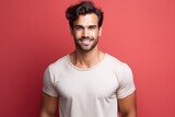 Portrait of a muscular handsome guy wearing a plain t-shirt, isolated on a pastel background. Generative AI illustration.
