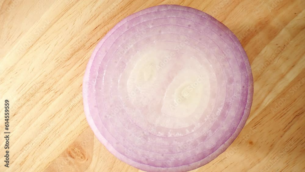 Captivating macro video showcasing the intricate layers and vibrant hues of half Red onions, captured with a probe lens. A mesmerizing exploration of nature's beauty. Captivating macro video showcasing the intricate layers and vibrant hues of half Red onions, captured with a probe lens. A mesmerizing exploration of nature's beauty.