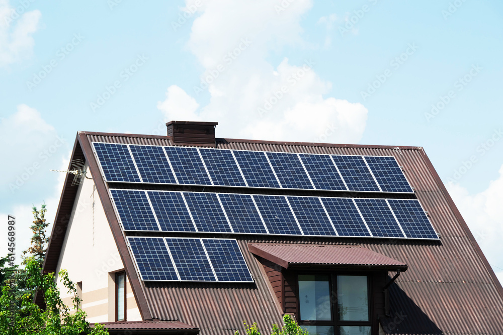 Fototapeta premium Installing a Solar Cell on a Roof.
