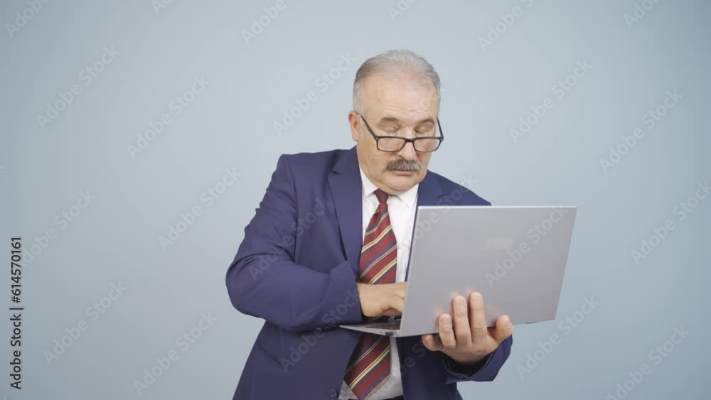 Tired businessman falling asleep at laptop. Tired businessman falling asleep at laptop.
