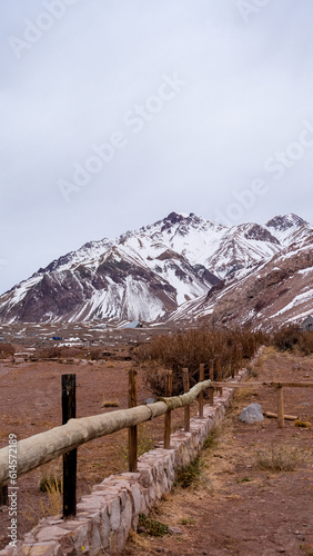 Wooden Fence in the snowed Andes mountains.