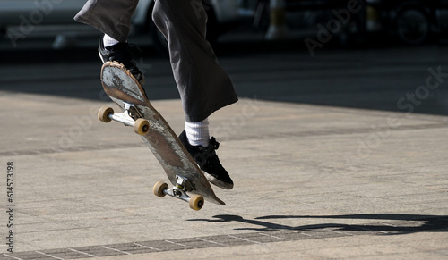 skateboarder in action on a track / Close up playing skateboard photo