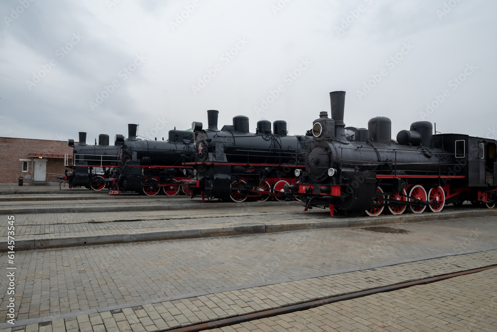 Fototapeta premium russian black retro train against a gloomy sky