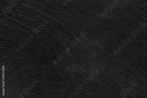 Dark grey black slate background or texture.