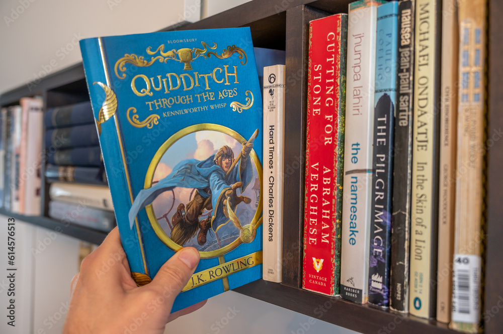 Naklejka premium Calgary, Alberta - June 17, 2023: Cover of J.K. Rowlings Quidditch Throught the Ages.