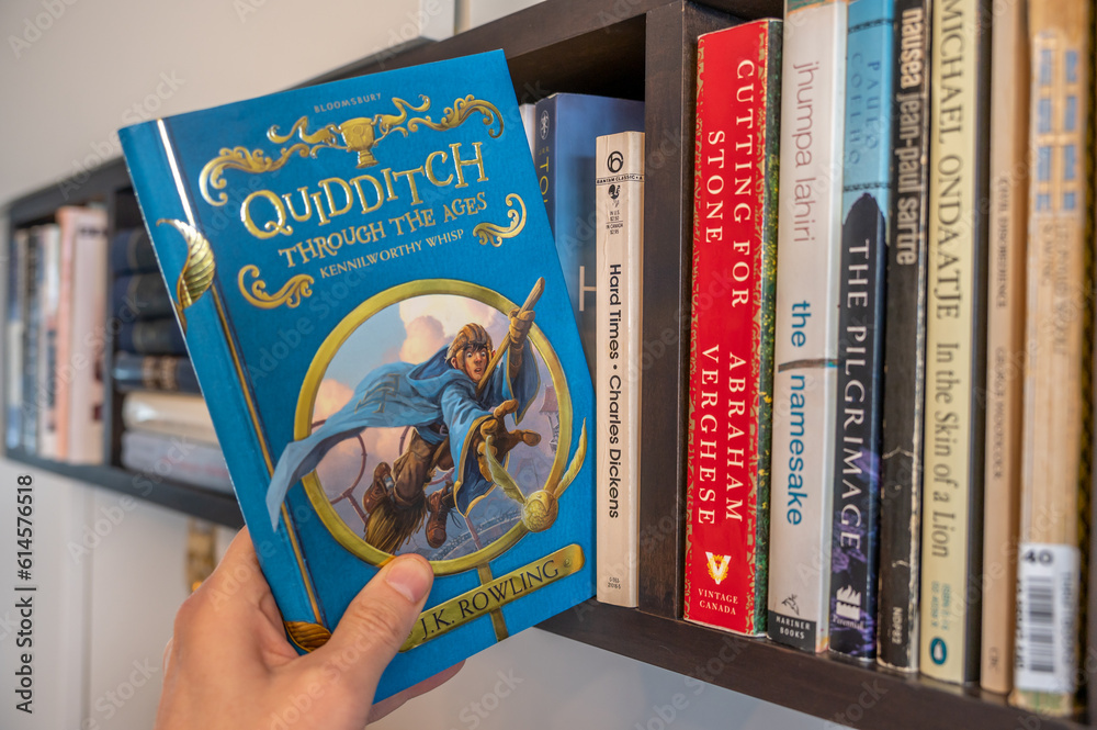 Fototapeta premium Calgary, Alberta - June 17, 2023: Cover of J.K. Rowlings Quidditch Throught the Ages.