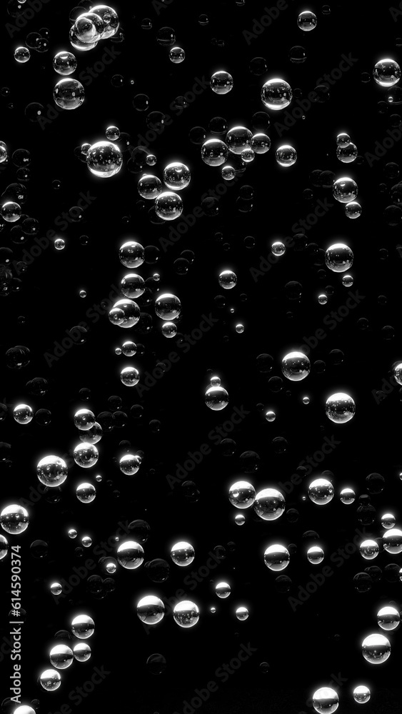 黒背景に複数の気泡。3d。（縦長）
