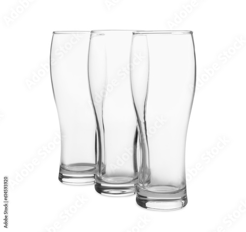 Elegant clean empty beer glasses isolated on white