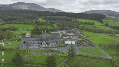 Drone establishing shot of Mount Melleray Abbey Cappoquin Waterford Ireland in the shadow of the Knockmealdown Mountains early spring morning Irelands Ancient East photo