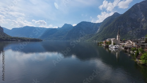 Beautiful travel place of Hallstatt heritage village summer in Austria: Hallstatter lake, mountain, clouds...