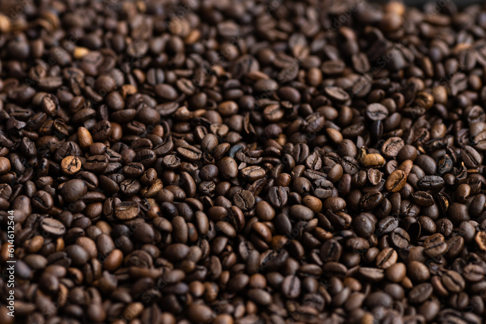 Macrophotography of roasted coffee beans.
