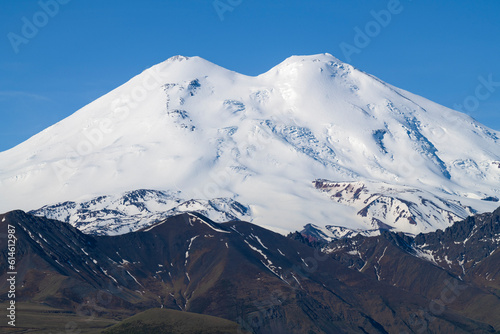 Mount Elbrus close-up on a sunny June morning. Kabardino-Balkaria, Russia