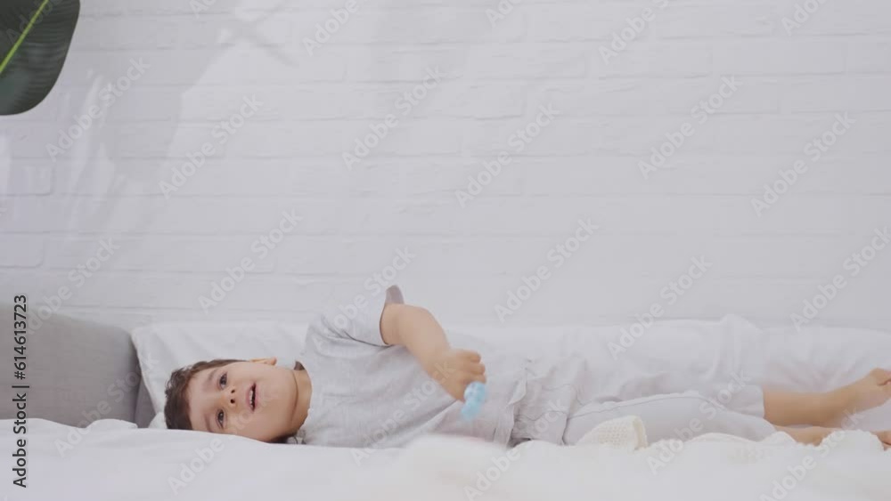 Happy child boy having fun frolicking in the morning Happy child boy having fun frolicking in the morning