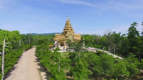 Aerial view of Phutthakaya Chedi, Chong Kham Temple, Ngao District, Lampang Province photo