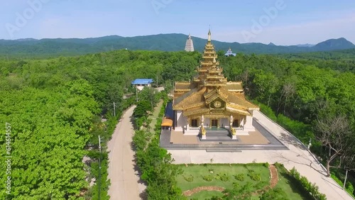 Aerial view of Phutthakaya Chedi, Chong Kham Temple, Ngao District, Lampang Province photo