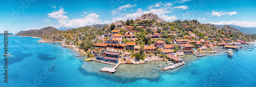 Fototapeta Naklejka Na Ścianę i Meble -  Aerial view of Simena castle and fishing and tourist village Kaleucagiz. Tourist and travel destinations in Turkey
