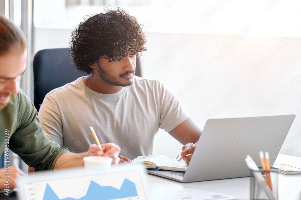 Successful hipster team in coworking. Freelancers. Successful hipster team in coworking. Freelancers.