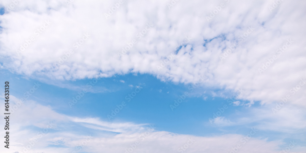 Blue sky with white altocumulus clouds on a daytime. Panorama Blue sky with white altocumulus clouds on a daytime. Panorama