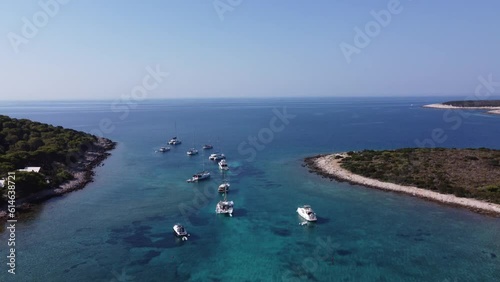 Various Boats and Catamaran Yachts anchored at Blue Lagoon Bay of Veliki Budikovac Island in Croatia.
Aerial photo