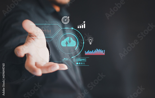 Hand holding virtual cloud computing with world and technology item such as upload download. Cloud technology management big data include business strategy , customer. 