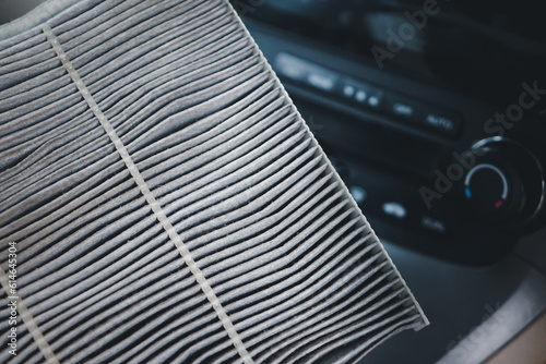new air filter for car, auto spare part. New car air filter in the engine photo