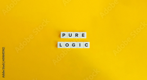Pure Logic Concept Image. Block Letter Tiles on Yellow Background. Minimal Aesthetic.