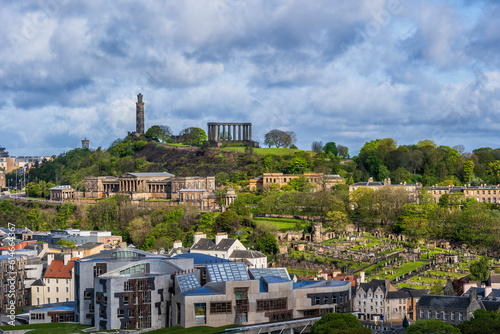 UK, Scotland, Edinburgh, Clouds over Calton Hill, Old Royal High School, New Calton Burial Ground and Scottish Parliamentary Building