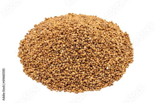 Buckwheat isolated on white background. Pile of buckwheat grains. close up