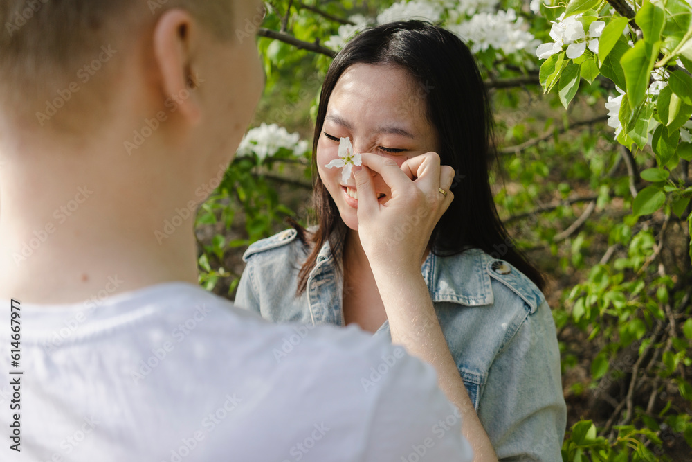 Romantic couple spending leisure time at park Romantic couple spending leisure time at park