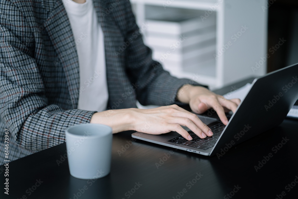 Male working on laptop keyboard at home office. Male working on laptop keyboard at home office.