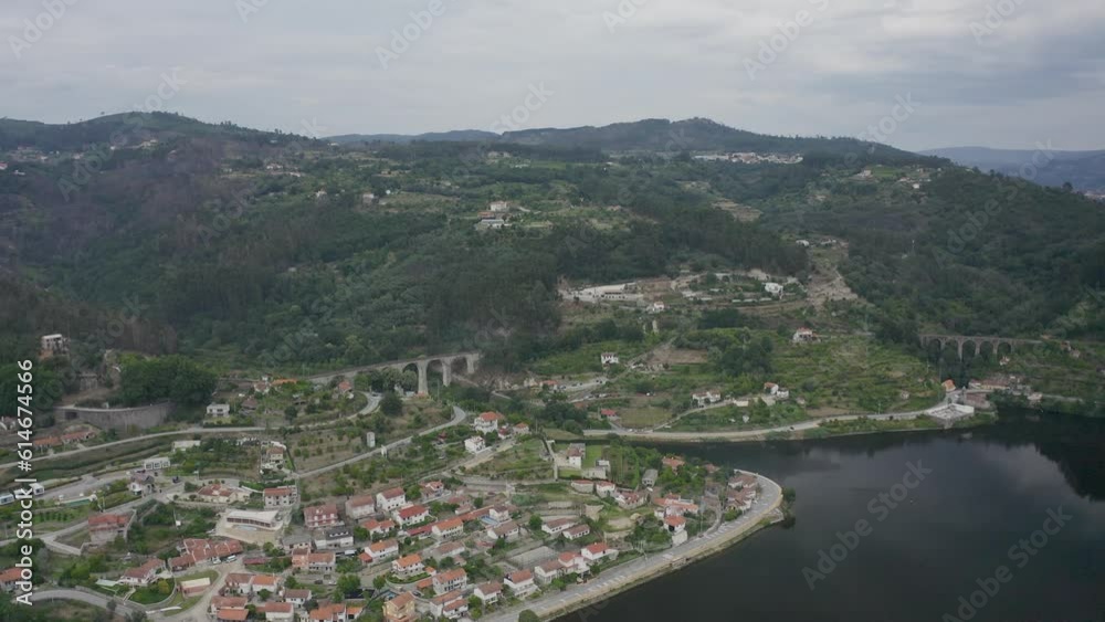 Aerial view of the magnificent Aqueduct in Baião over douro river, Douro, Portugal, showcasing its grandeur and architectural beauty. Aerial view of the magnificent Aqueduct in Baião over douro river, Douro, Portugal, showcasing its grandeur and architectural beauty.