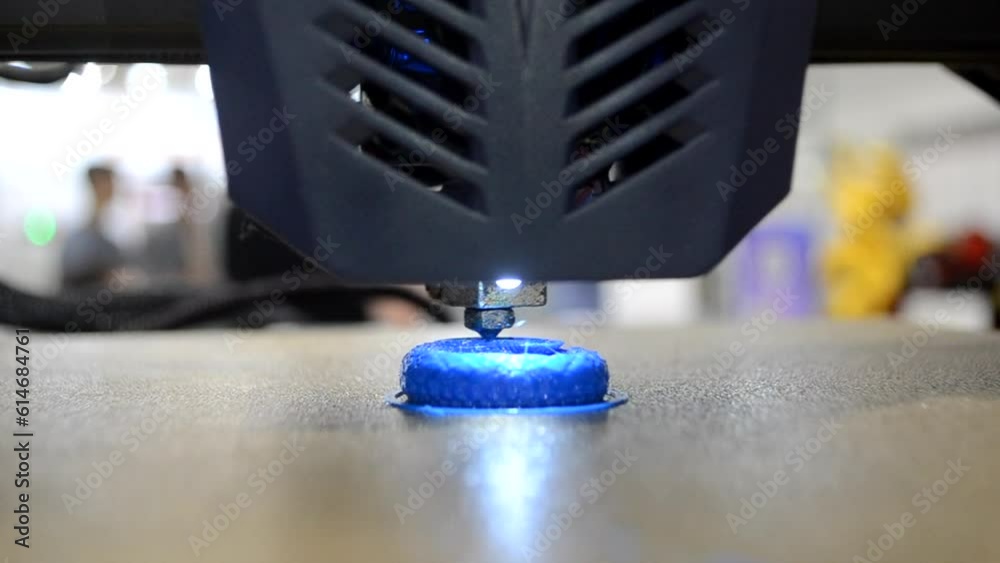 3D printer. 3D printer printing process close-up. 3D printer creating object from molten plastic. 3D printing. Innovation additive robotic technology. Modern three-dimensional printing technologies 3D printer. 3D printer printing process close-up. 3D printer creating object from molten plastic. 3D printing. Innovation additive robotic technology. Modern three-dimensional printing technologies