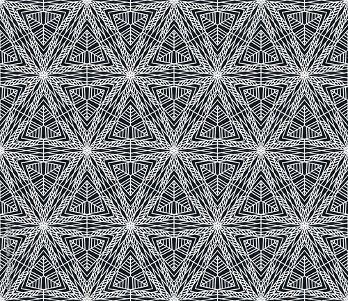 Black and white seamless tillable simple pattern with floral and ornamental accents
