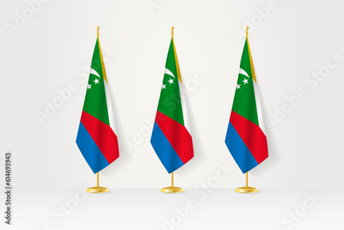 Three Comoros flags in a row on a golden stand, illustration of press conference and other meetings.