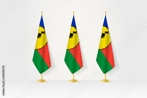 Three New Caledonia flags in a row on a golden stand, illustration of press conference and other meetings.