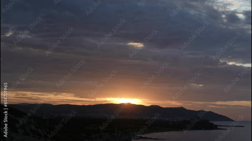 Dramatic Time Lapse Golden Sunrise over Majestic Mountain Range during the Early Morning Dramatic Time Lapse Golden Sunrise over Majestic Mountain Range during the Early Morning