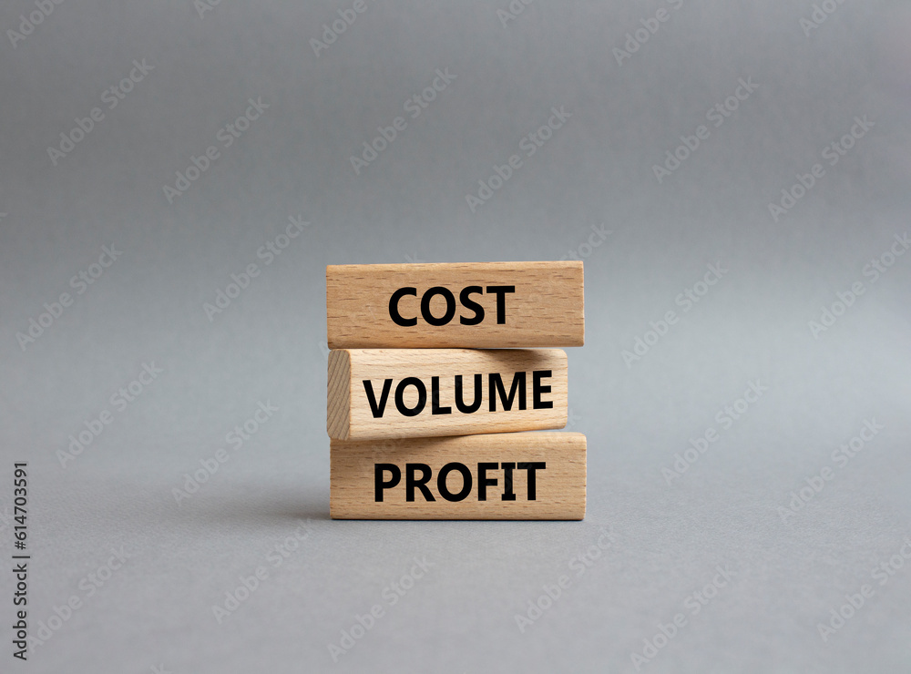 Cost Volume Profit symbol. Concept word Cost Volume Profit on wooden blocks. Beautiful grey background. Business and Cost Volume Profit concept. Copy space Cost Volume Profit symbol. Concept word Cost Volume Profit on wooden blocks. Beautiful grey background. Business and Cost Volume Profit concept. Copy space