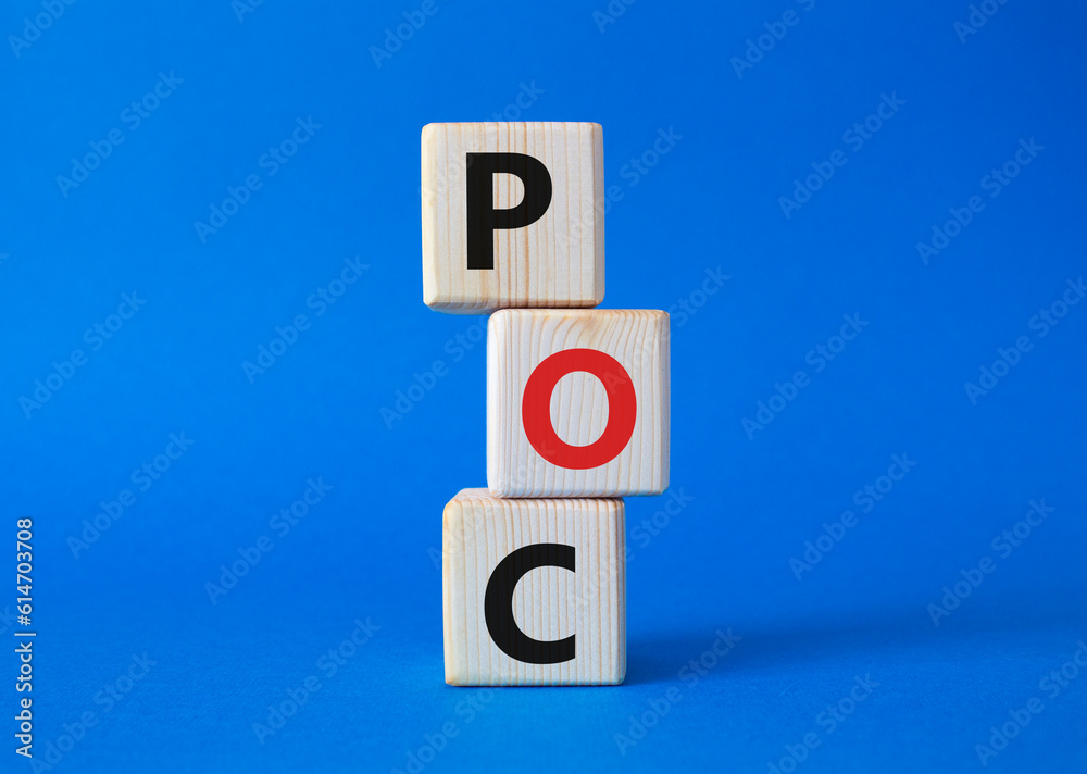 POC - Proof of Concept symbol. Wooden cubes with words POC. Beautiful blue background. Business and POC concept. Copy space. POC - Proof of Concept symbol. Wooden cubes with words POC. Beautiful blue background. Business and POC concept. Copy space.