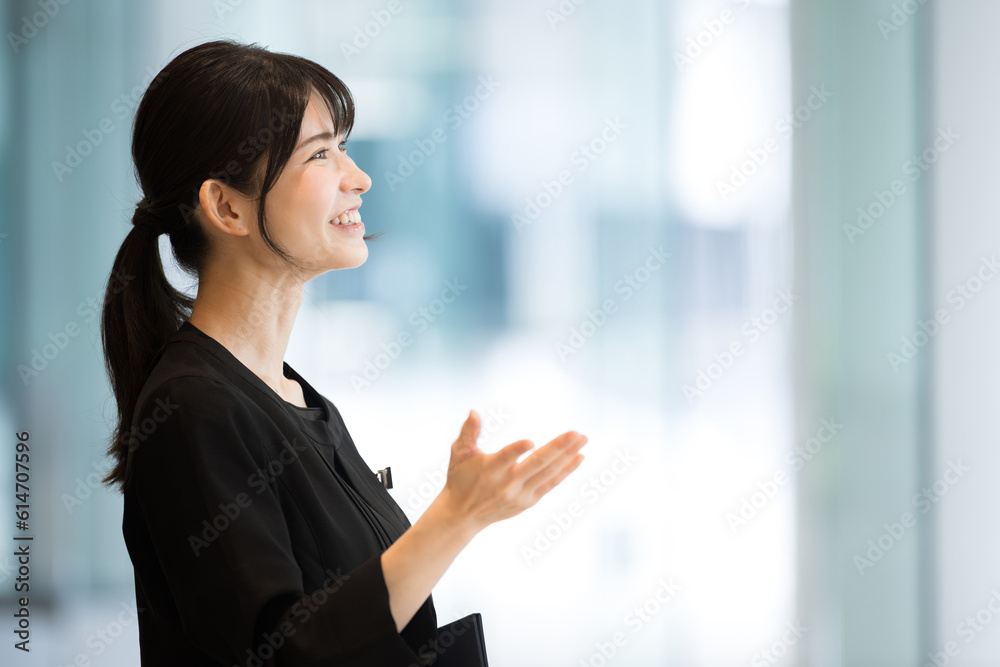 Japanese woman at hotel reception or front desk, guiding visitors to the image of Japanese tourism and travel. Japanese woman at hotel reception or front desk, guiding visitors to the image of Japanese tourism and travel.