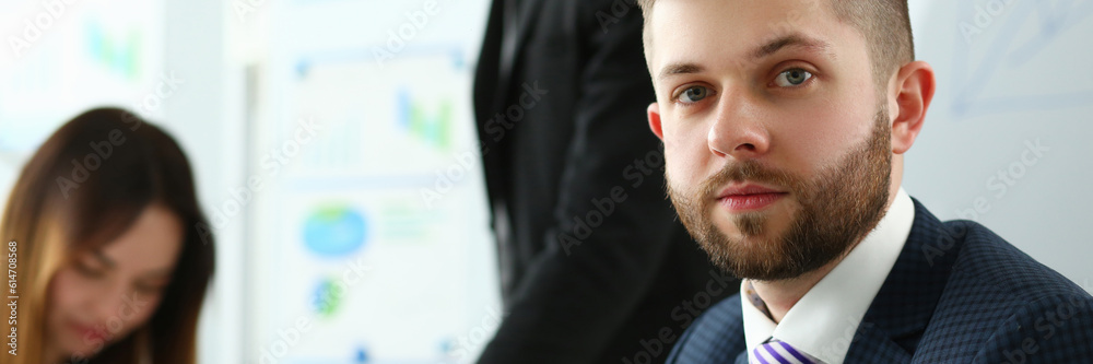 Obraz premium Portrait of leader with business team behind. business advice and assistant consultant concept